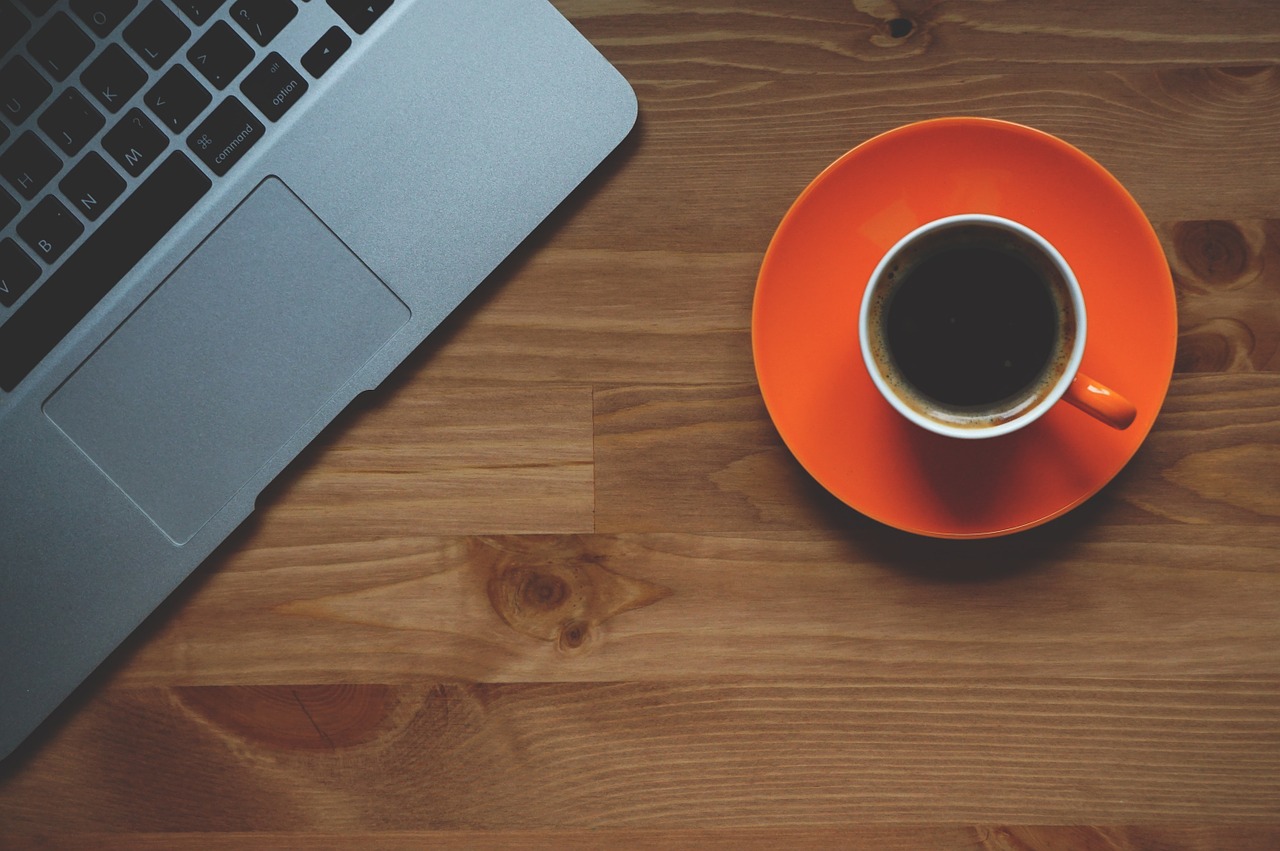 Image - cup of coffee laptop office macbook