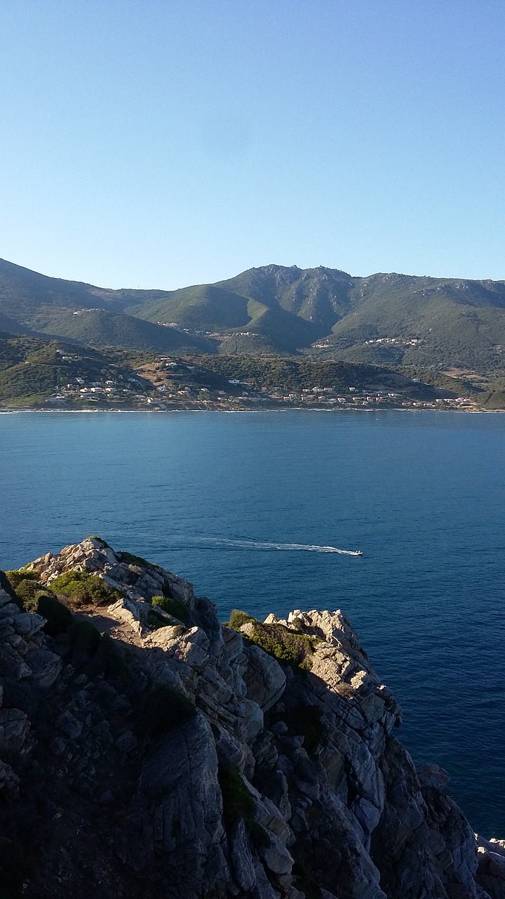 Image - cliff boat sea seaside side rock