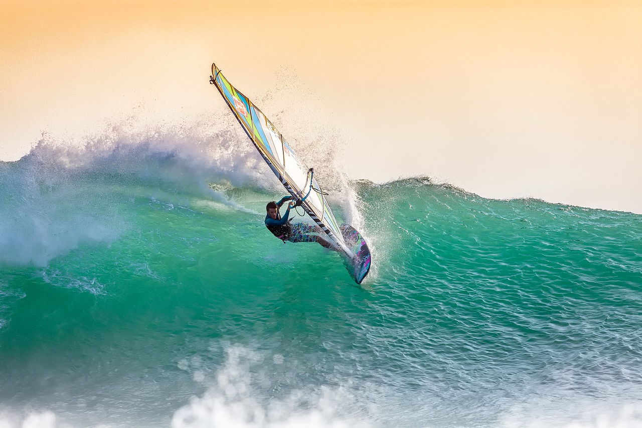 Image - windsurfing big waves at dusk