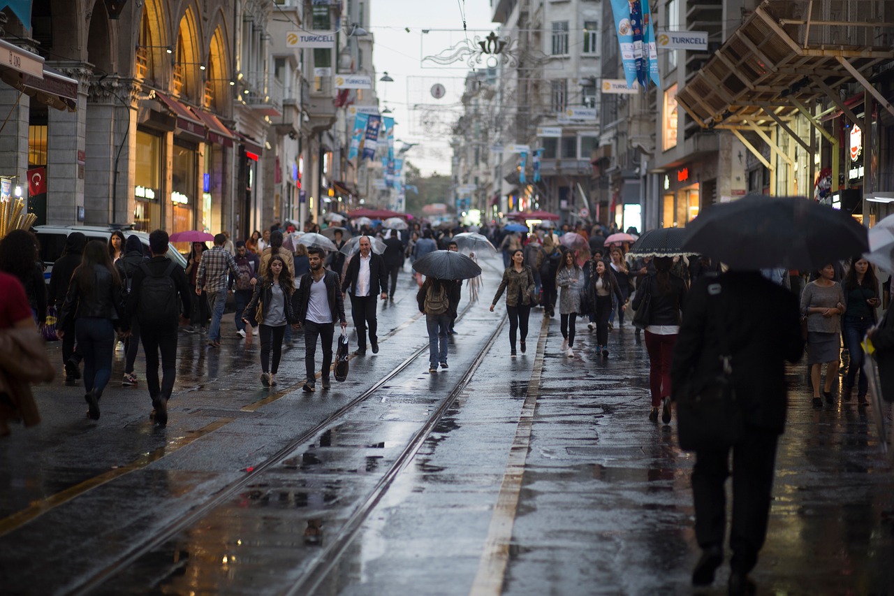 Image - city people crowd men women rainy