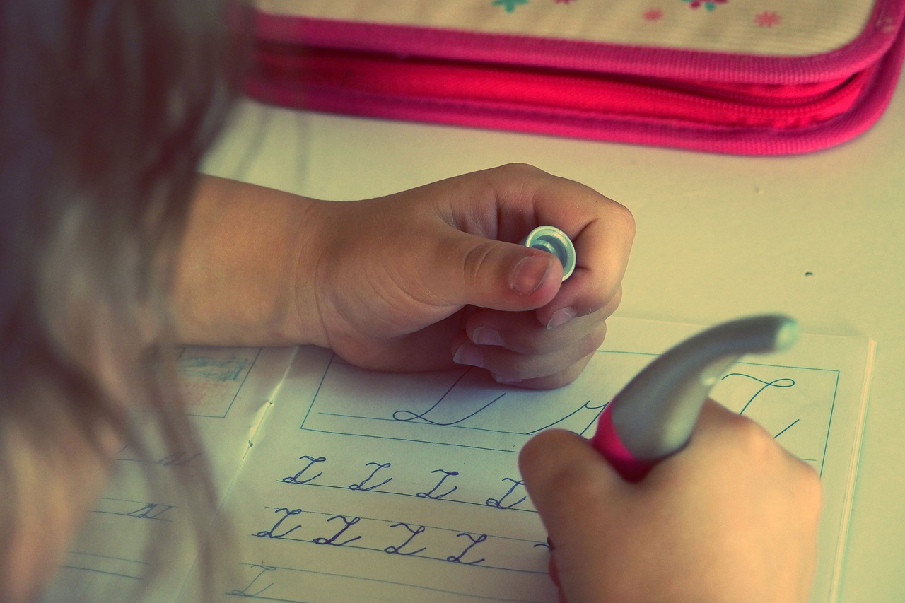 Image - child kid writing homework letters